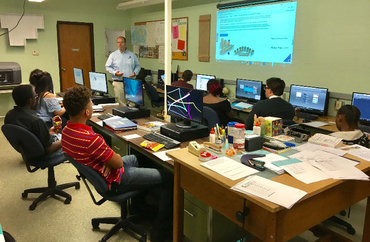 John Evans talks to students